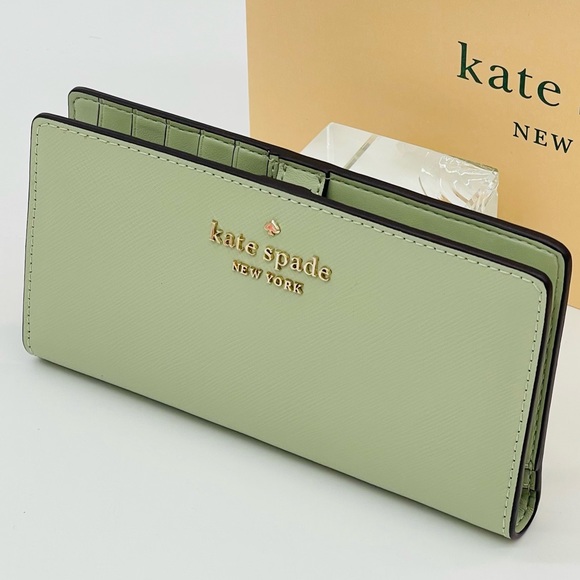kate spade Handbags - Kate Spade Large Slim Bifold Wallet